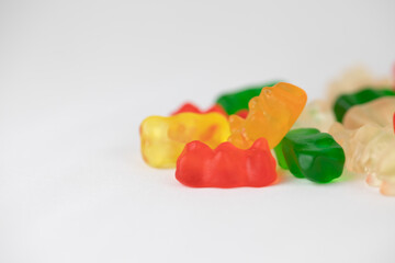 Colorful and delicious gummy bear candies with a white background