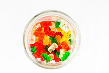 Colorful and delicious gummy bear candies with a white background