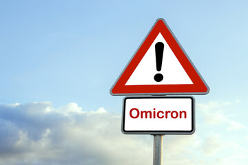 road sign with the word Omicron