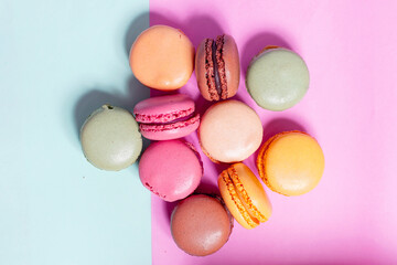 Colourful macaroons on a bright colourful background