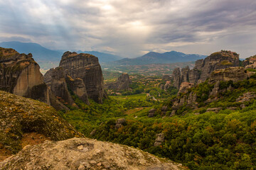 Fototapeta na wymiar Great view of the ancient monasteries and the impressive and picturesque valley of Meteora, Greece
