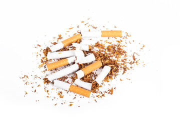 a few cigarettes. they are damaged and poured to the surface. on a white background. close-up