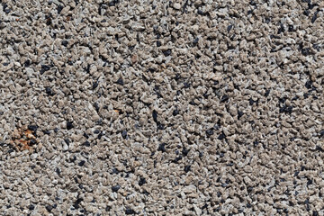Crushed granite stones wall - close up