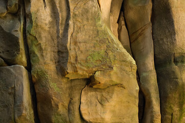 Natural walls of sandstone - rocks with deep crevices - abstract backgrounds