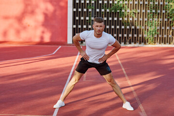 man on the sports ground exercise warm-up lifestyle