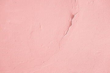 Abstract background of old cracked wall with crack, trendy pinkl color