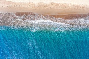 Poster Top view aerial drone photo of Perissa beach with beautiful turquoise water and sea waves. Vacation travel background. Aegean sea, Santorini Island, Greece © Nikolay N. Antonov