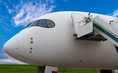 Fragment of the plane and ladder in airdrome