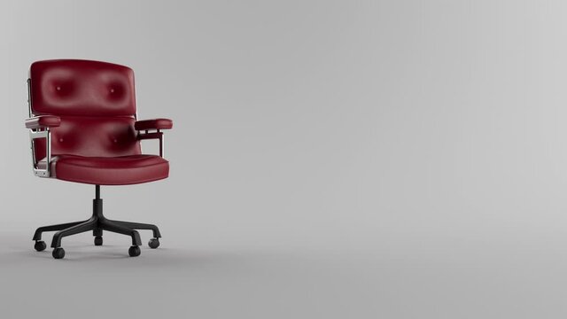 A fancy chrome office chair with cushioning covered in red leather pushed across a white studio spinning to a stop facing the camera