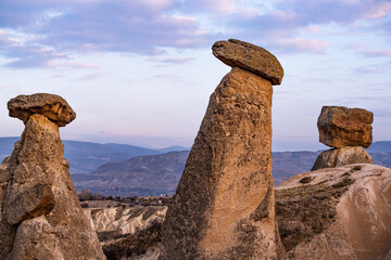 Moody panoramic view of the Three Beauties rock formations near Goreme, Cappadocia, Turkey