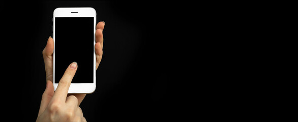 Mobile phone and index finger isolated, product demonstration concept. Copy space, template photo