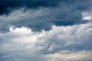 Cirrus clouds of the night sky. Thunderclouds.