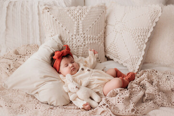 beautiful girl sleeping on a white bed