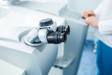 Microscopic apparatus for testing eyesight. Ophthalmology and treatment of eye diseases. Eye...