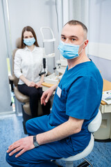Fototapeta premium Ophthalmologist consultation in a modern new hospital. A modern doctor working with the patient's health.