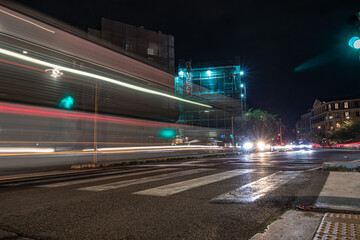 Fototapeta na wymiar Cool long exposure cars traffic light trails, night view of the city of Rome 