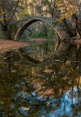 Ancient venetian bridge of Tzelefos in Cyprus in autumn
