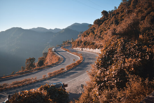 Highway on the mountains during an autumn season