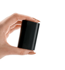 Camera battery in female hand isolated on white