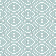 Seamless vector light blue and white dotted ornament. Modern background. Geometric modern pattern