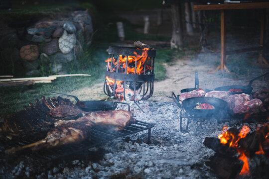 Typical Argentine barbecue cooked over a fire in the countryside