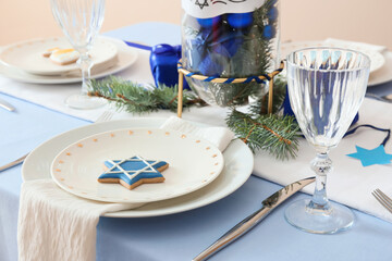 Beautiful table setting for Hanukkah celebration in dining room