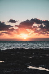 Fototapeta premium sunrise breaching the clouds