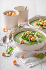 Creamy spinach soup as perfect spring healthy diet.