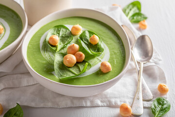 Healthy spinach soup as tasty and healthy appetizer.