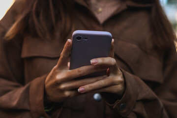 Beautiful girl chatting in her mobile