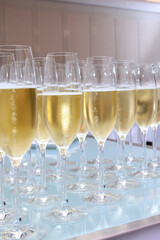 Gala dinner or event. Glasses with champagne on the table. Holidays concept. Secular reception. Buffet at a secular party. Lots of wine glasses.