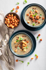 Homemade mushrooms soup as aromatic and hot starter.