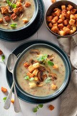 Mushrooms soup with champignons, herbs and cream.