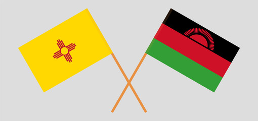 Crossed flags of the State of New Mexico and Malawi. Official colors. Correct proportion