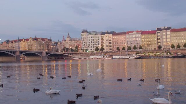 Beautiful embankment of the old town of Prague in the evening. Bridge over the river. Tourist point for photography and romantic walks.