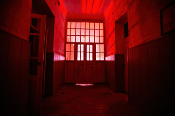 Dark and creepy corridor of old abandoned mental hospital at night