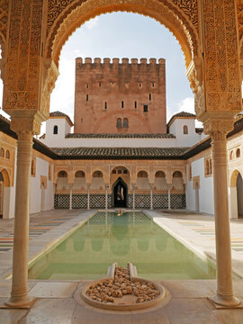 Mallorca, Palma, November 12th 2019: The famous Alhambra of Poble Espanyol in Palma de Mallorca, Spain. The decorated architecture courtyard and water pool feature.