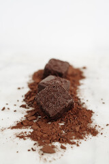 Dark Chocolate Petit Four Cakes on Cocoa and Sprinkles Vertical, Valentine's Day Dessert