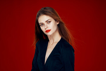 Fototapeta premium red-haired woman with red lips posing hairstyle glamor