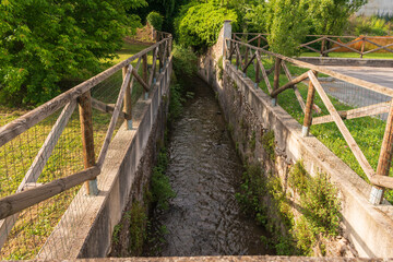 River going into the woods