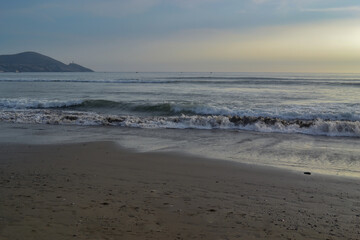 Fototapeta na wymiar The shore of a beach in the Pacific Ocean.