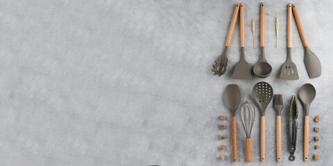  Set of kitchen utensils on a gray background. The concept of the kitchen, the preparation of...