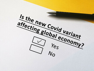 One person is answering question about new coronavirus variant. The person thinks the new covid variant is affecting global economy