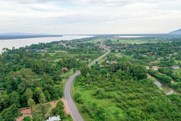 Scenic aerial view flying over the land field.