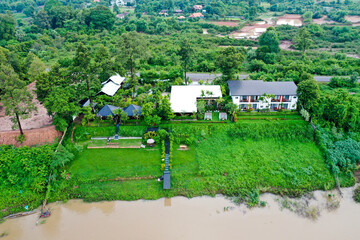 Scenic aerial view flying over the land field.
