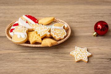Merry Christmas with homemade cookies on wood table background. Xmas, party, holiday and happy New Year concept