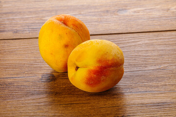 Fototapeta na wymiar Two Sweet ripe tasty peaches