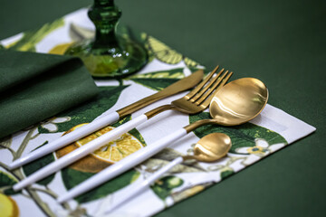 Close-up of a set of cutlery on a served table.