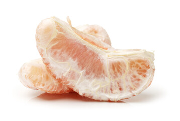 peeled pomelo pieces isolated on white background. Tasty fresh fruit eating concept.