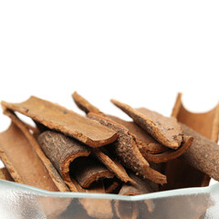 Cinnamon Sticks and Ground Cinnamon on a white background